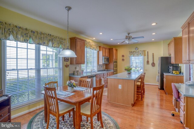 29865 Hillary Ave, Easton, MD 21601 - dining room featuring ceiling fan, light wood-type flooring, recessed lighting, and baseboards