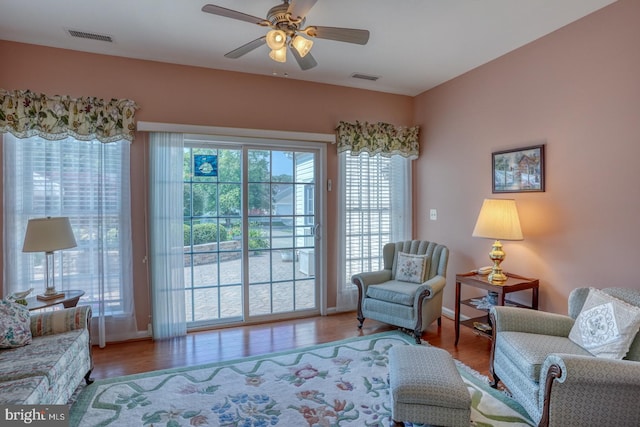 29865 Hillary Ave, Easton, MD 21601 - living area featuring ceiling fan, wood finished floors, and baseboards