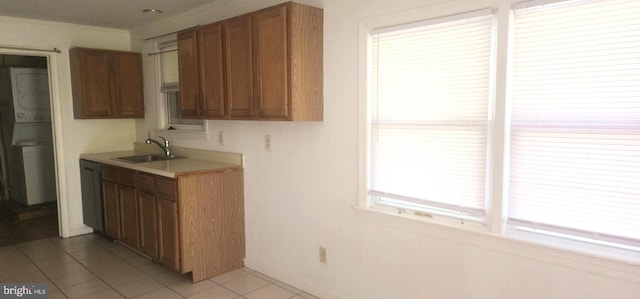 7602 Old Linton Hall Rd, Gainesville, VA 20155 - kitchen featuring a sink, light tile patterned floors, brown cabinets, and light countertops
