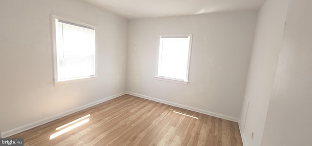 7602 Old Linton Hall Rd, Gainesville, VA 20155 - empty room featuring light wood-style flooring and baseboards