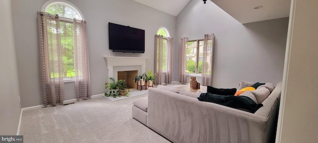 4 E Spring Oak Cir, Media, PA 19063 - living room featuring lofted ceiling, baseboards, carpet flooring, and a fireplace