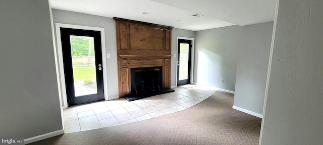 4 E Spring Oak Cir, Media, PA 19063 - unfurnished living room featuring light colored carpet, healthy amount of natural light, a large fireplace, and baseboards