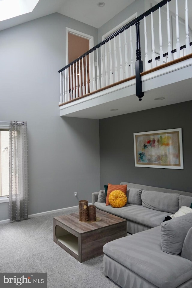 4 E Spring Oak Cir, Media, PA 19063 - carpeted living area with high vaulted ceiling and baseboards