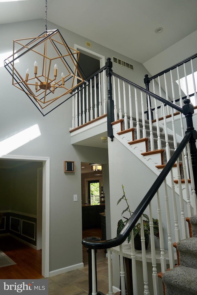 4 E Spring Oak Cir, Media, PA 19063 - stairway featuring high vaulted ceiling, baseboards, and wood finished floors