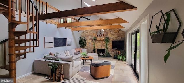 4 E Spring Oak Cir, Media, PA 19063 - living room featuring beamed ceiling, stairs, a skylight, ceiling fan, and a stone fireplace