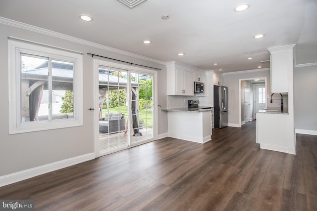 351 Doone Rd, Fairless Hills, PA 19030 - kitchen with appliances with stainless steel finishes, ornamental molding, a sink, healthy amount of natural light, and baseboards