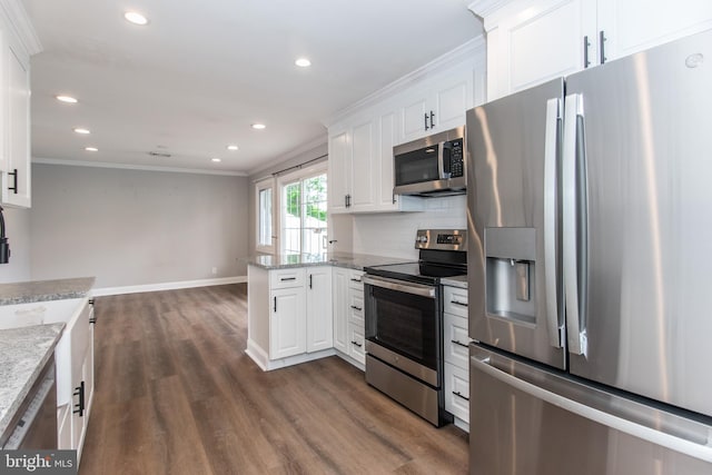 351 Doone Rd, Fairless Hills, PA 19030 - kitchen with stainless steel appliances, white cabinets, dark wood-style flooring, ornamental molding, and a peninsula