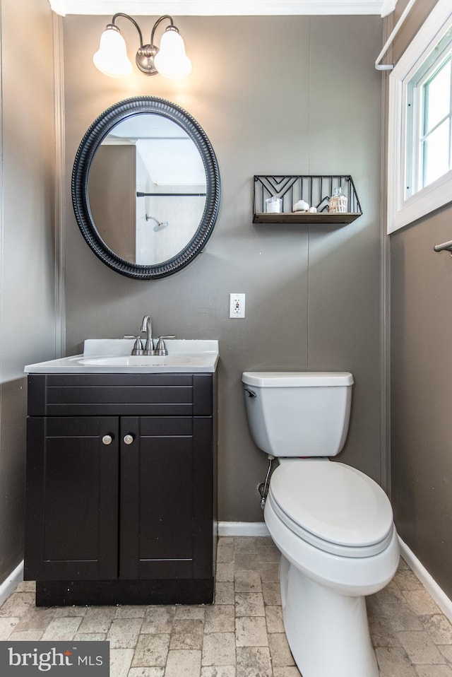 351 Doone Rd, Fairless Hills, PA 19030 - bathroom featuring baseboards, stone tile floors, vanity, and toilet