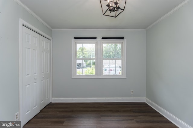 351 Doone Rd, Fairless Hills, PA 19030 - unfurnished bedroom with a chandelier, dark wood-style floors, ornamental molding, a closet, and baseboards