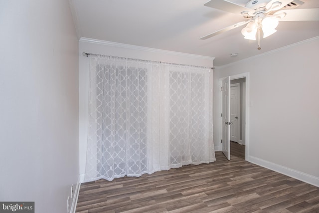 351 Doone Rd, Fairless Hills, PA 19030 - unfurnished bedroom with wood finished floors, crown molding, baseboards, and a ceiling fan