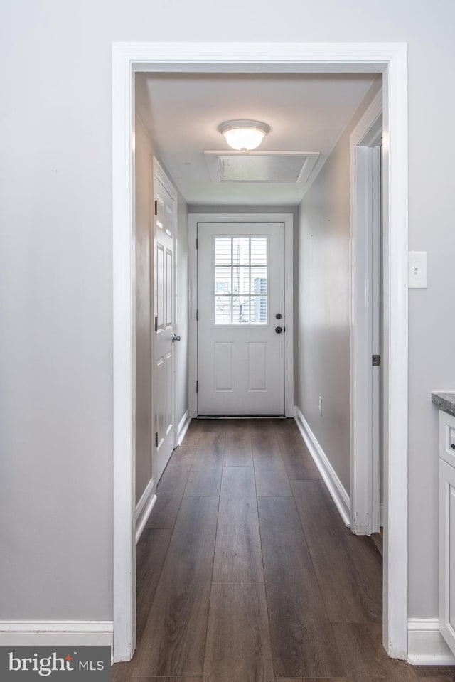 351 Doone Rd, Fairless Hills, PA 19030 - doorway to outside with baseboards and dark wood-style floors