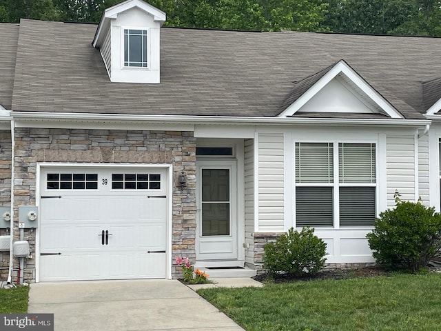 39 Starfire Ct, Dover, DE 19901 - view of front facade with stone siding, concrete driveway, and roof with shingles