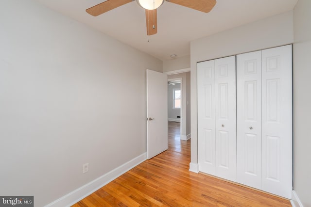 1738 Stokesley Rd, Baltimore, MD 21222 - unfurnished bedroom featuring light wood-style floors, baseboards, a closet, and ceiling fan