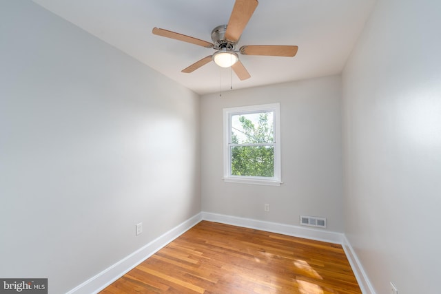 1738 Stokesley Rd, Baltimore, MD 21222 - empty room with baseboards, light wood-type flooring, and ceiling fan