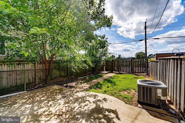 1738 Stokesley Rd, Baltimore, MD 21222 - fenced backyard featuring central AC and a patio area