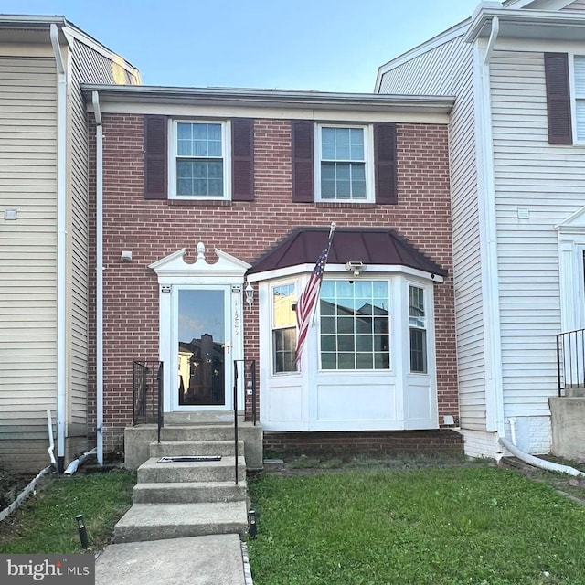 11289 Kessler Pl, Manassas, VA 20109 - view of property featuring brick siding