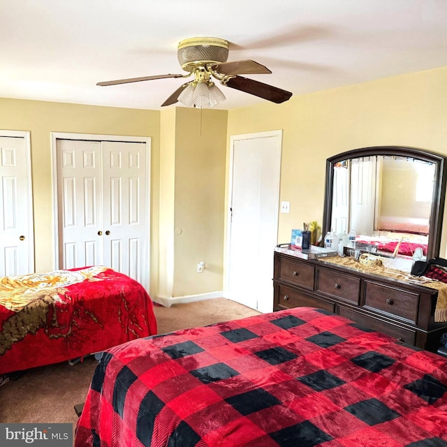 11289 Kessler Pl, Manassas, VA 20109 - bedroom featuring light colored carpet, two closets, ceiling fan, and baseboards