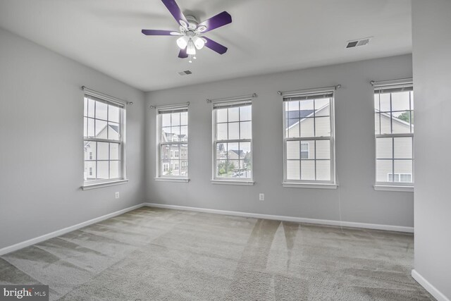 12517 Rustic Rock Ln, Beltsville, MD 20705 - unfurnished room with baseboards, a ceiling fan, and carpet