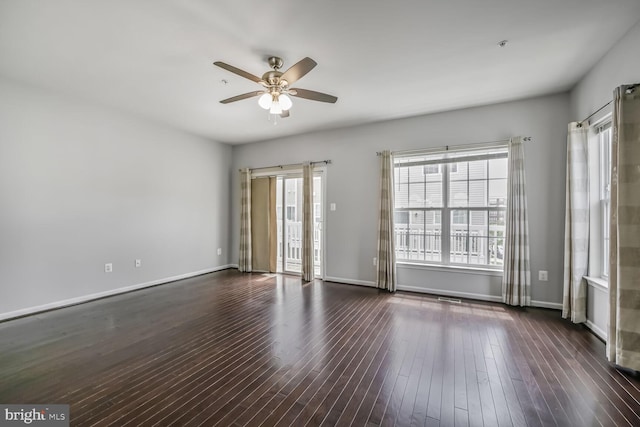 12517 Rustic Rock Ln, Beltsville, MD 20705 - spare room featuring ceiling fan, plenty of natural light, wood finished floors, and baseboards