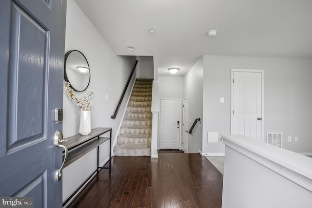 12517 Rustic Rock Ln, Beltsville, MD 20705 - entryway with dark wood finished floors, baseboards, and stairway