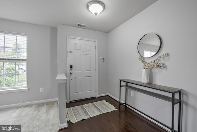 12517 Rustic Rock Ln, Beltsville, MD 20705 - foyer entrance with plenty of natural light, baseboards, and wood finished floors