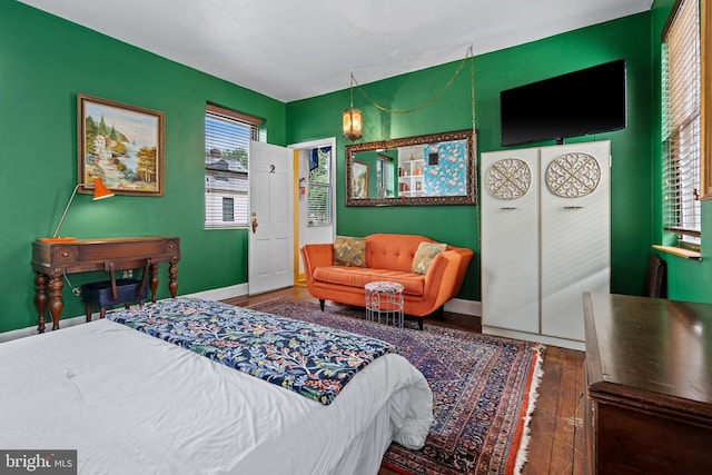 503 N Paca St, Baltimore, MD 21201 - bedroom featuring wood-type flooring and baseboards