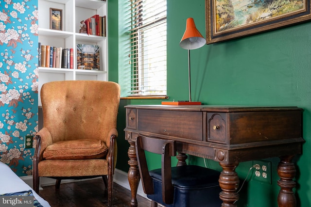 503 N Paca St, Baltimore, MD 21201 - living area featuring wallpapered walls, wood finished floors, and baseboards