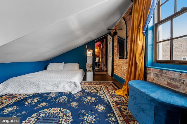 503 N Paca St, Baltimore, MD 21201 - bedroom with lofted ceiling and wood finished floors