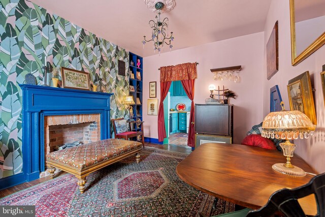 503 N Paca St, Baltimore, MD 21201 - living room featuring wood finished floors and a fireplace
