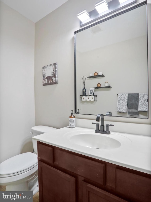 112 Toulouse Ln, Martinsburg, WV 25403 - half bathroom featuring vanity and toilet