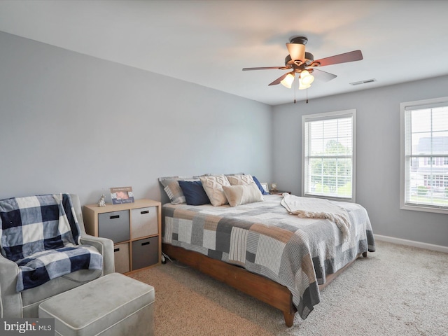 112 Toulouse Ln, Martinsburg, WV 25403 - bedroom featuring multiple windows, carpet, baseboards, and a ceiling fan