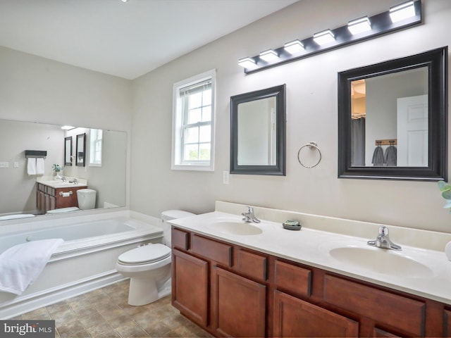 112 Toulouse Ln, Martinsburg, WV 25403 - bathroom with double vanity, toilet, and a bath