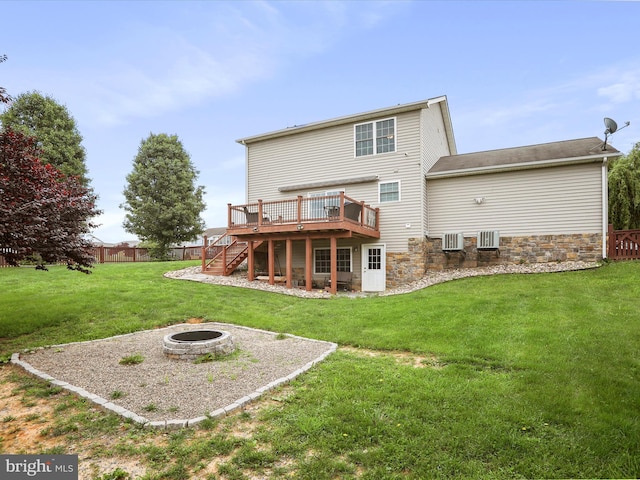 112 Toulouse Ln, Martinsburg, WV 25403 - back of property featuring an outdoor fire pit, stairs, a deck, and stone siding