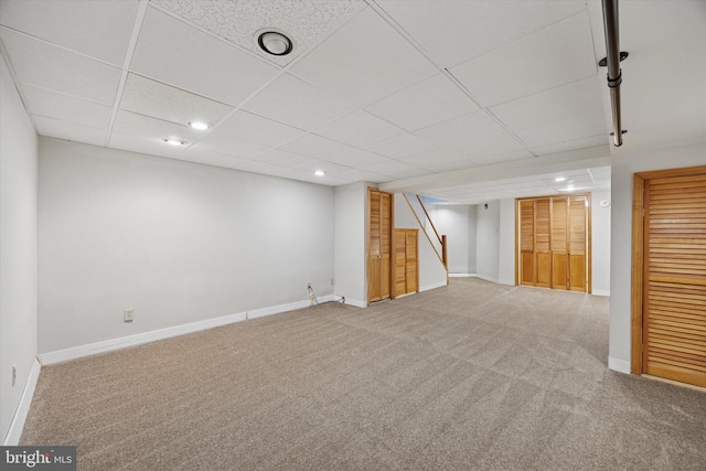 413 Eagle Rd # 7, Wayne, PA 19087 - finished below grade area with carpet floors, baseboards, stairway, a drop ceiling, and recessed lighting