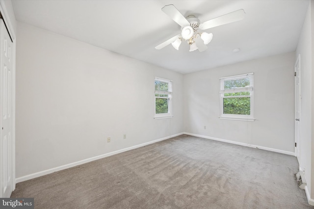 413 Eagle Rd # 7, Wayne, PA 19087 - unfurnished bedroom featuring a closet, multiple windows, carpet flooring, and baseboards