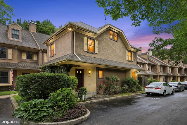 413 Eagle Rd # 7, Wayne, PA 19087 - townhome / multi-family property with a chimney, uncovered parking, and stucco siding