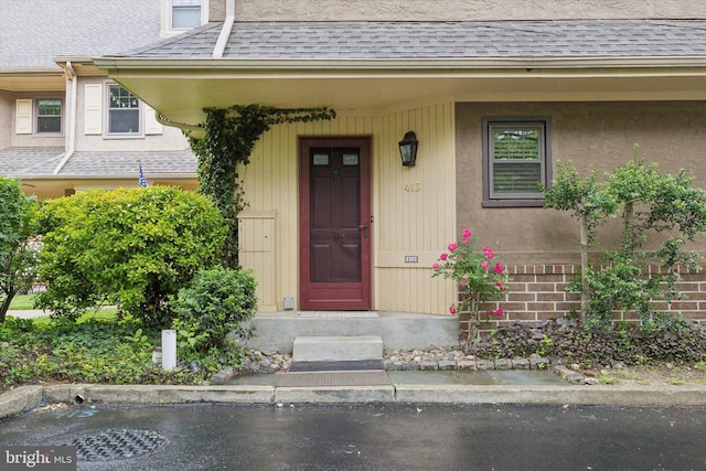 413 Eagle Rd # 7, Wayne, PA 19087 - entrance to property featuring a shingled roof
