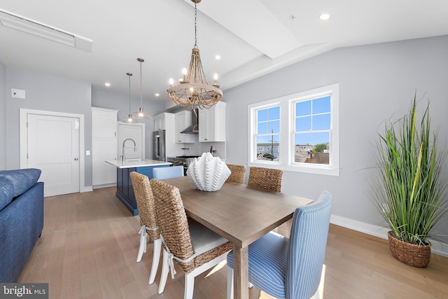 2600 Long Beach Blvd Unit 12, Long Beach Township, NJ 08008 - dining area with a chandelier, light wood finished floors, recessed lighting, lofted ceiling, and baseboards