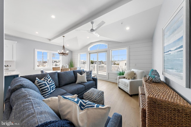 2600 Long Beach Blvd Unit 12, Long Beach Township, NJ 08008 - living area with a chandelier, plenty of natural light, vaulted ceiling, light wood finished floors, and a ceiling fan