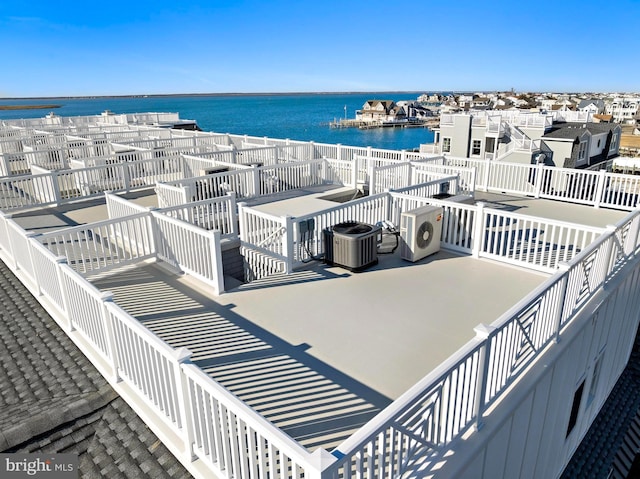 2600 Long Beach Blvd Unit 12, Long Beach Township, NJ 08008 - view of patio / terrace featuring a water view and cooling unit