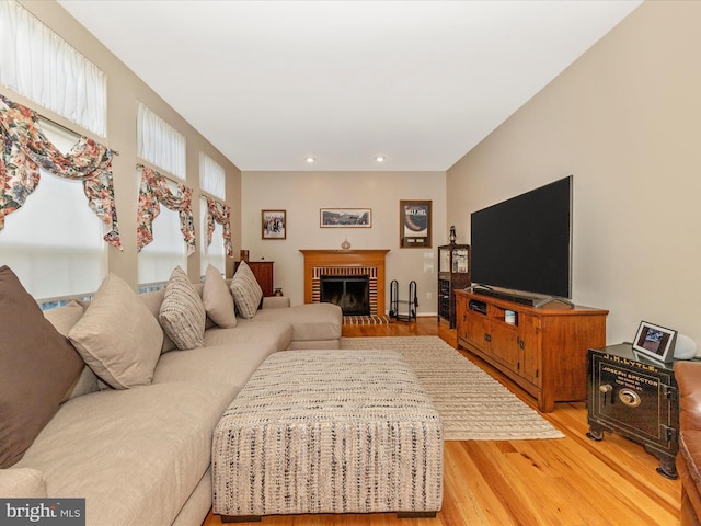 6810 Morrow Way, Frederick, MD 21703 - living room with light wood finished floors, a fireplace, and recessed lighting