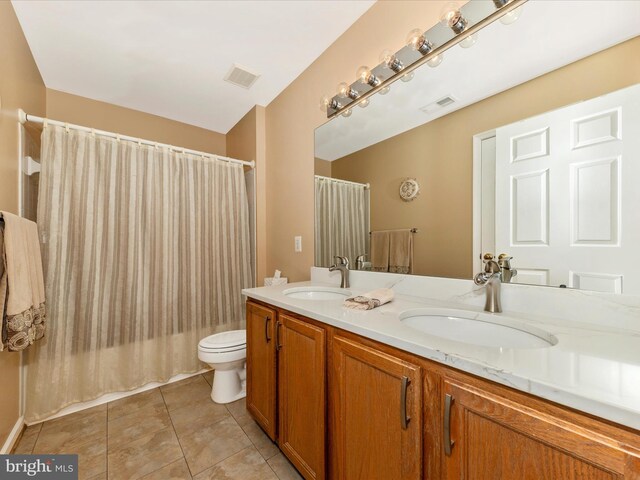 6810 Morrow Way, Frederick, MD 21703 - full bathroom with toilet, double vanity, tile patterned flooring, and shower / bathtub combination with curtain