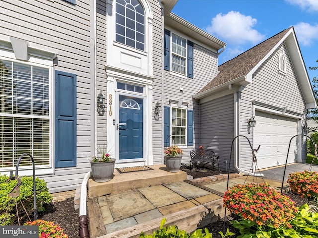 6810 Morrow Way, Frederick, MD 21703 - doorway to property featuring asphalt driveway, a garage, and a shingled roof
