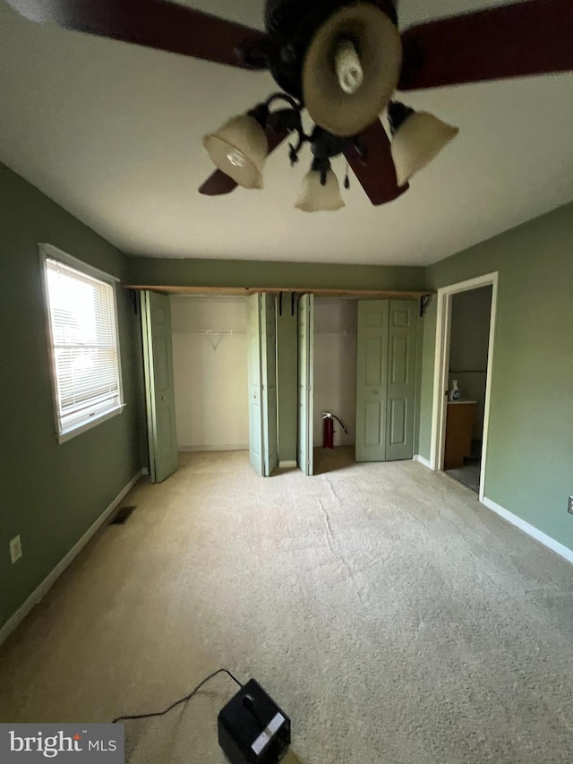 745 Cedar Ct, Red Hill, PA 18076 - unfurnished bedroom featuring light carpet and two closets
