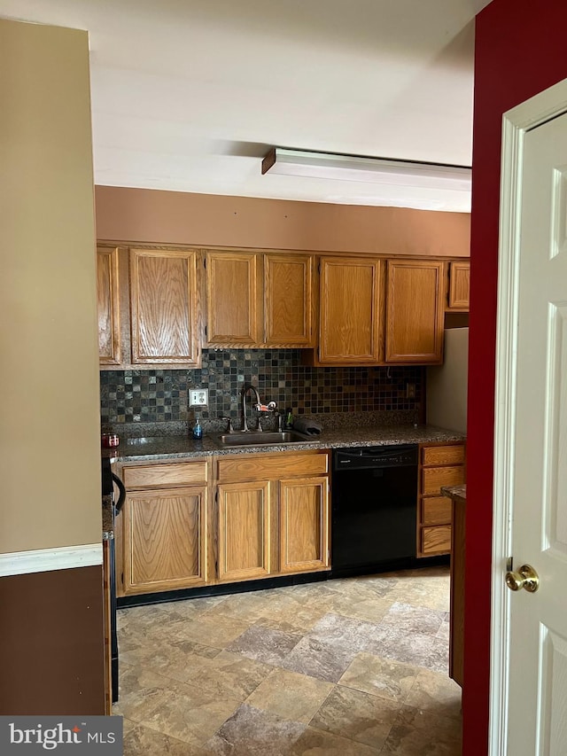 745 Cedar Ct, Red Hill, PA 18076 - kitchen with black dishwasher, stone finish flooring, brown cabinets, decorative backsplash, and dark countertops