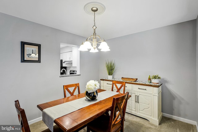 1085 Smartts Ln NE, Leesburg, VA 20176 - dining area featuring a chandelier, baseboards, and light colored carpet