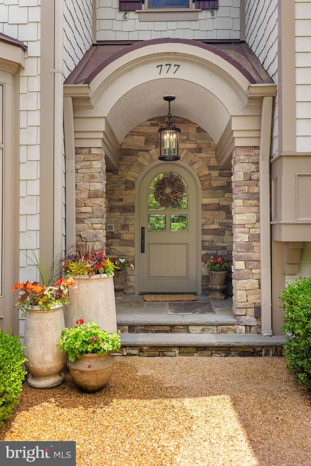 777 3rd St, Herndon, VA 20170 - entrance to property featuring stone siding