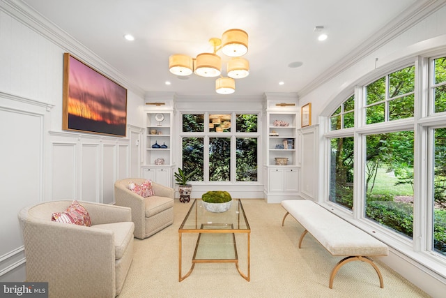 777 3rd St, Herndon, VA 20170 - carpeted living room with ornamental molding, built in shelves, and recessed lighting
