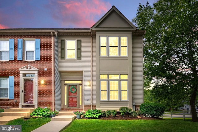 6201 Knolls Ct, Elkridge, MD 21075 - townhome / multi-family property with brick siding and a front yard