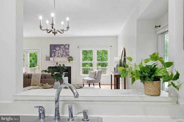 6201 Knolls Ct, Elkridge, MD 21075 - detailed view of a chandelier, a fireplace, and a sink